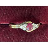 9ct Gold ring set with ruby & 6 diamonds to should