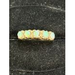 9ct Gold ring set with 5 Opals Size N