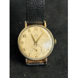 Gents 9ct gold (Smith) 15 jewel wristwatch Moreis