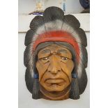 Carved native american wall mask