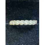 9ct Gold ring set with 7 diamonds Size O 1.8g