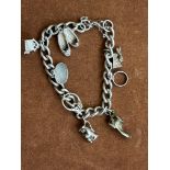 Silver charm bracelet - 25 charms