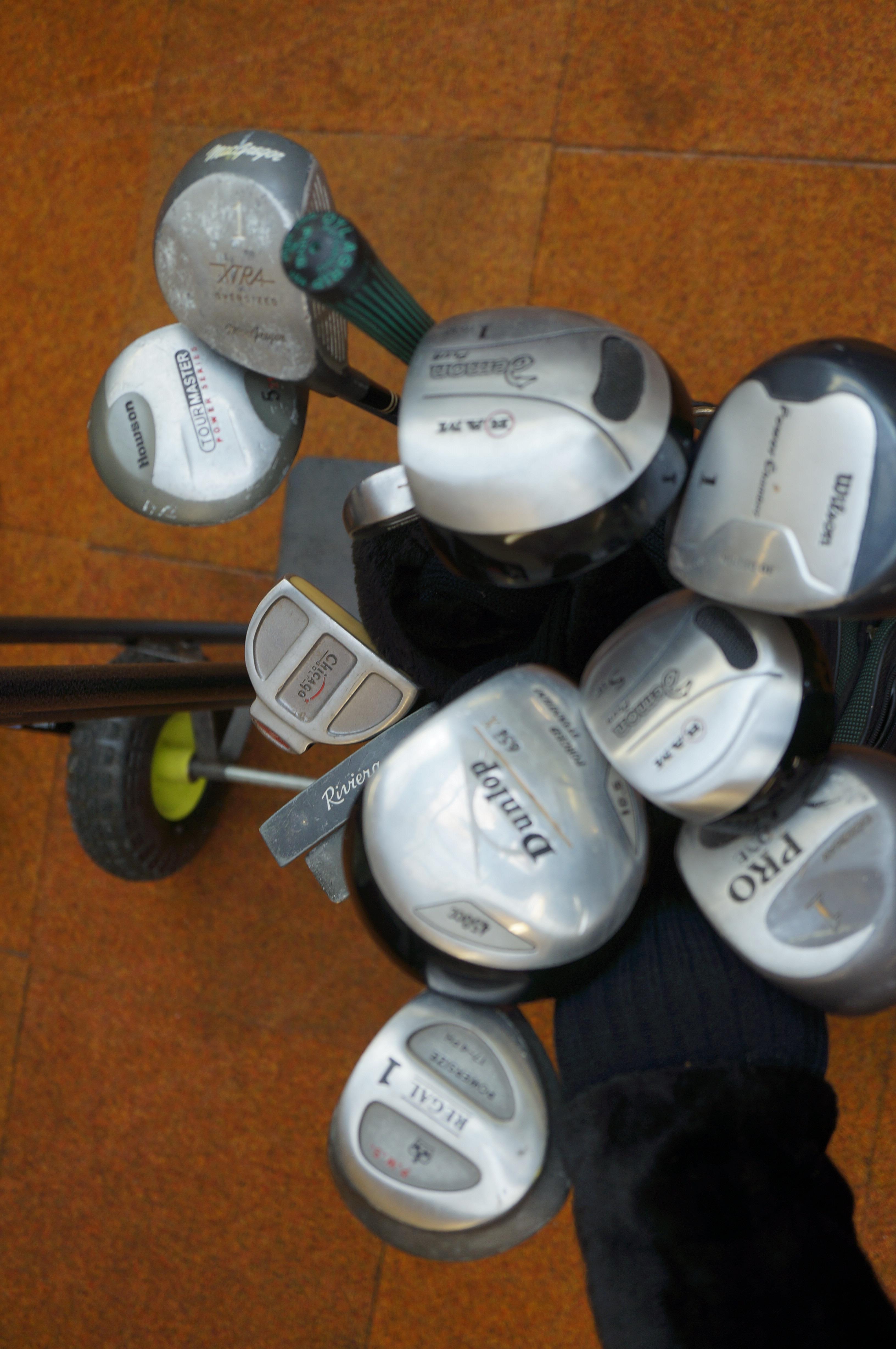 Collection of golf clubs to include Wilson Driver,