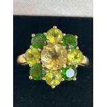 9ct Gold ring set with green & light green stones