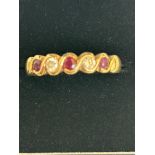 9ct Gold ring set with rubies & diamonds 3.9g Size