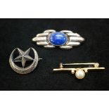 3 Silver brooches