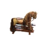 Early rocking horse, fully restored December 2002.