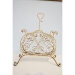 Early cast iron paper rack