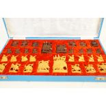 Oriental set of wooden chess pieces