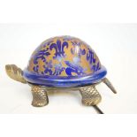Lamp in the form of a turtle