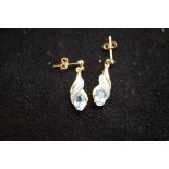 Pair of 9ct gold earrings set with white & blue st