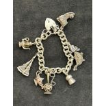 Silver charm bracelet 76.5g 8 charms