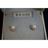 Pair of 9ct gold earrings set with Austrian crysta