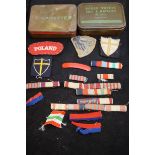 Military badges & 2 vintage tins