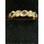 9ct Gold ring set with 3 sapphires & 2 diamonds Si