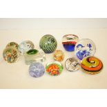 12 Assorted paperweights to include Mdina