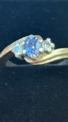 9ct Gold ring set wit blue topaz & diamonds Size O