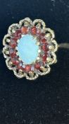 9ct Gold ring set with red garnets & opal Size O 2