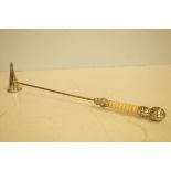Early white metal candle snuffer