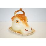 Cheese dish in the form of a cow