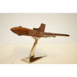 Large wooden vulcan bomber on chrome stand