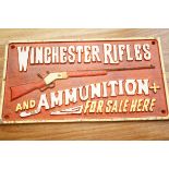 Cast iron sign Winchester rifles