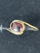 9ct Gold ring set with red stone Size Q 1g