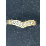 9ct Gold wishbone ring set with 7 cz stones Size O