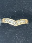 9ct Gold wishbone ring set with 7 cz stones Size O