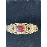 9ct Gold ring set with red garnet stone Size W 2.2