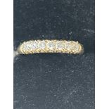 9ct Gold ring set with 7 cz stones Size Q 1.5 g