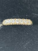 9ct Gold ring set with 7 cz stones Size Q 1.5 g