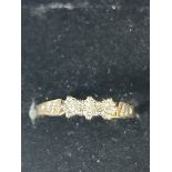 9ct Gold ring set with 3 diamonds Size M 1.8g