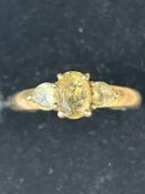 9ct Gold ring set with light green stones Size S 2