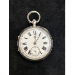 Silver fuse pocket watch with key