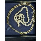 Oroton necklace together with a pearl necklace