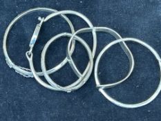 Bag of silver bangles