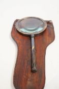 Large brass magnifying glass in leather case