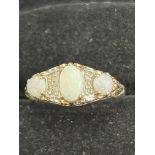 9ct Gold ring set with opals Size N