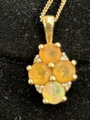 9ct Gold chain & pendant, pendant set with 4 opals