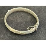 Silver bangle with safety chain Weight 45g