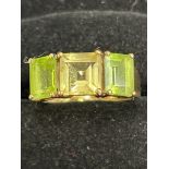 9ct Gold ring set with 2 peridot & citrine stones