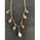 Gold plated necklace suspended with 7 eggs