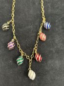 Gold plated necklace suspended with 7 eggs