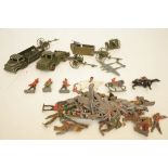 Collection of vintage metal military toys together