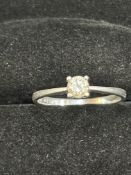 Silver ring set with .25 carat diamond Size M