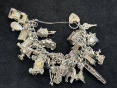 Large & heavy silver charm bracelet Weight 131g