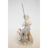 Lladro figure of a boy with animals