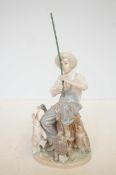Lladro figure of a boy with animals