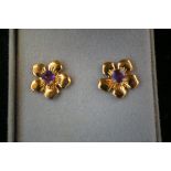 Pair of 14ct gold earrings set with amethyst